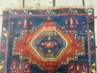 Caucasian rug in very good condition. It is 275x147, has at least two synthetic dyes, a rose red and one blue that has faded to bluish grey but also a couple of  ...