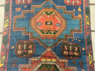 Caucasian rug in very good condition. It is 275x147, has at least two synthetic dyes, a rose red and one blue that has faded to bluish grey but also a couple of  ...