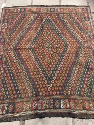 Antique verneh cower woven in one piece, probably Karabagh, Azerbaijan 1880-1910. All colours are organic and it has minor wear in the middle. A splendid piece.       