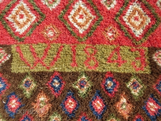 Finnish double sided ryijy rug, the front is in very good condition, signed and dated w1843, 175x135 cm. One end is folded, so the rug is not reduced. Not so easy to  ...