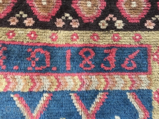 Finnish double sided wedding ryijy rug, signed and dated IKID 1836. Published as plate 5 in Finland’s Ryor by U.T. Sirelius. It’s in good overall condition having lost just a few knots.  ...