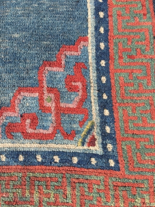 Antique Tibetan khaden rug, 1850-1875. In good condition and with lovely colours.                     