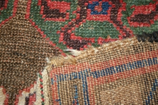 Old Kurdish all wool rug, 115x178 cm.
Great, shiny wool and some nice corrosion and wear.
Lovely green colour.
Two corners has lost some knots.
Rug has no repairs.        