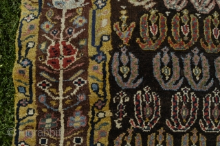 Very strange and exiting NW Persian rug, perhaps mid 19th c. with the most beautiful border and very good colours. Reduced at one end, 315x106 cm.
Some irregular knoting, mostly good pile and  ...