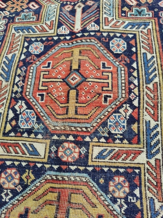 Antique and rare Armenian Kuba prayer rug (139 cm. x 104 cm.) Fine piece with good colors, and a special shield design. Low pile, with uneven wear, tiny holes here and there,  ...