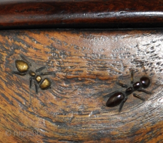 A Japanese inkwell and brush holder (yatate) in wood and staghorn. The brush holder is made of Malaysian hardwood (tagayasan) with the opening rimmed in horn.  The inkwell is carved from a  ...