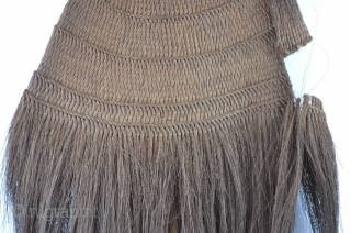 A large Japanese straw hat used by hunters and farmers. Plaited with smoked straw fibers, with a fabric chin-strap. A rare Mingei piece in fine conditions.
A more elaborate hat of this kind,  ...