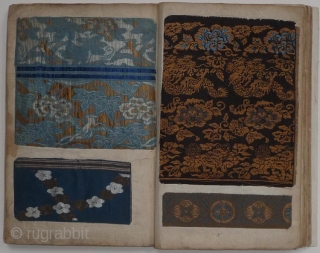 Japanese book with a collection of Japanese textile fragments, mainly brocade. One hundred forty example pasted on forty-eight pages.     
The album ca. 1900, the textiles 19th and early  ...