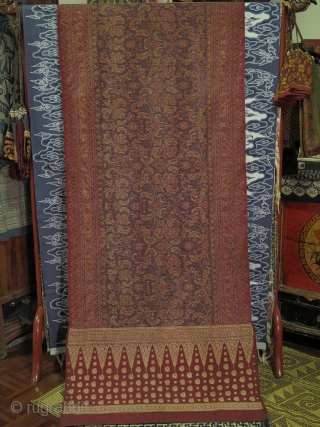 Kain Limar Salandang : Female Shoulder Cloth with elaborate ikat work of floral pattern. Both ends framed with supplementary weft work of golden threads featuring Tumpal design. From Malay ethnic group in  ...
