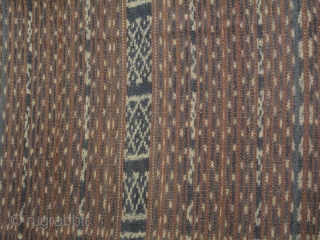 A long tube skirt from Flores Island area, Indonesia. All handspun cotton and vegetable dyes in a unique and subtle hues of indigo and maroon. Est age first half of 20th C.  ...