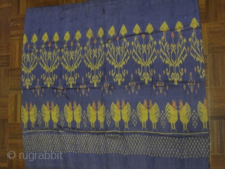 A weft ikat silk tube skirt from Northeastern Thailand with lovely repeating series of double facing chickens on the lower half while the upper part adorned with series of graphical bouquet motif.All  ...