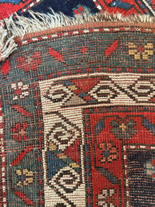 Caucasian Kazak Rug with Turtle Medallions, ca. 1885–1910
90 × 160 cm | Wool on wool | Symmetrical knots | Red wefts

A bold and compact village weaving with twin stylized “turtle” medallions on  ...