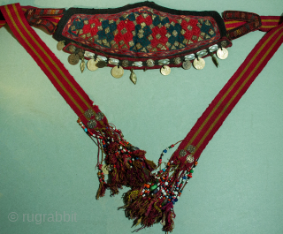  Early rare style Ersari Turkmen headdress with very old upper silver bosses 19th c with additional early  20th c silver and coins , long tie Tassel ends have trade beads  ...