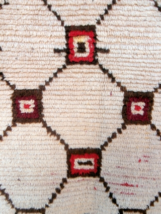 MOROCCAN BERBER HIGH ATLAS RUG A very old, soft and supple rug from the part of the High Atlas which extends from east of Marrakech to the Algerian border. Although classified as  ...