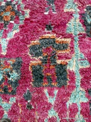MOROCCAN BERBER HIGH ATLAS CARPET. An old and rare carpet from the Berbers of Ait bou Ichaouen in the eastern High Atlas near the border with Algeria. Weaving in this remote area  ...