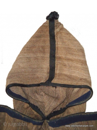 MOROCCAN BERBER MAN'S CAPE WITH HOOD Many types of cape, or jellaha, are worn by men throughout Morocco. This is an example known as "al bornoz" and is used by shepherds to  ...