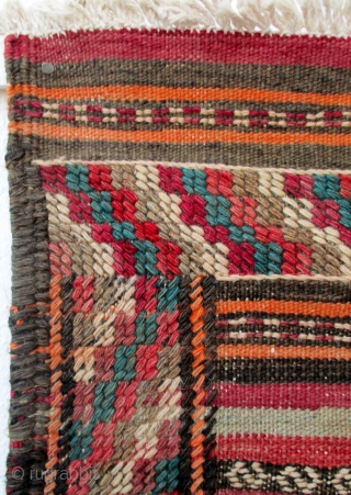 KURDISH KILIM FROM THE REGION OF QUCHAN which lies between the city of Meshed and extends north to the Persian border with Turkmenistan. It is a fine old piece with dozens of  ...
