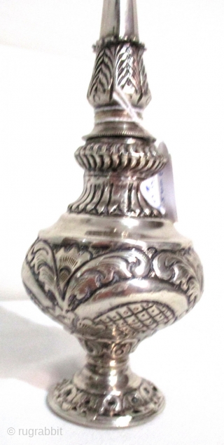 ANTIQUE SILVER ROSE WATER SPRINKLER from the Ottoman period of about 1850 in Constantinople. These delicate silver vessels were filled with rose petal scented water which was poured on the hands of  ...