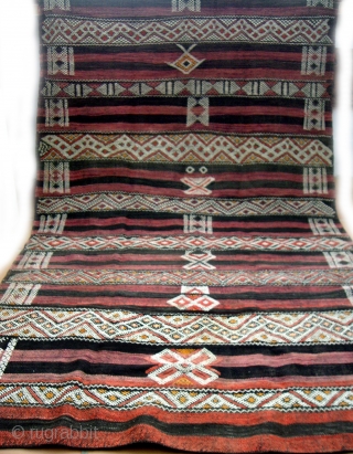 MOROCCAN MIDDLE ATLAS BERBER FLAT WEAVE/KILIM which dates from the first half of the 20th century. It originates from the Beni Mguild Berber group in the northern section of the Middle Atlas  ...