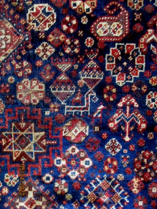 ANTIQUE QUASHKAI RUG -- Which has an immense depth of colours together with a silky lustrous sheen when wafted. The weaver has drawn extensively from the botany, bird and mammel life around  ...