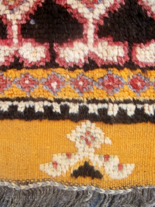 MOROCCAN BERBER HIGH ATLAS CARPET from the Ait Zenaga Berber tribe. Although the deep field color is typical of Ait Zenaga weaving the rest of the colors and design are most unusual  ...