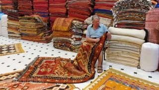 MOROCCAN BERBER HIGH ATLAS CARPET. The high knot density and lustrous shades of the many colors used makes this old example special. Many Ait Tamassine Berber pieces have this overall effect of  ...