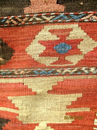 OLD PERSIAN SHAH SAVAN KILIM dating from the first half of the last century and attributed to the Shah Savan of the Khamseh group. It is woven on mid brown hand spun  ...