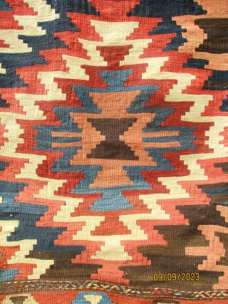OLD PERSIAN SHAH SAVAN KILIM dating from the first half of the last century and attributed to the Shah Savan of the Khamseh group. It is woven on mid brown hand spun  ...