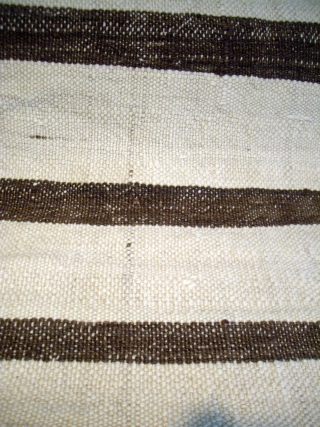 MOROCCAN MIDDLE ATLAS KILIM - This extraordinary flat weave is woven from soft, silky, undyed hand spun Berber wools. It is a very long piece which probably owes its excellent condition to  ...