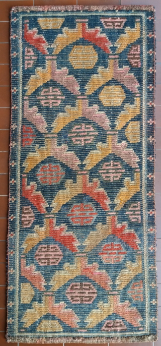 Very nice old Tibetan rug, very early 1900, very pleasant colors, very nice and soft wool, very unusual small size (circa 113 by 49 cm), very good condition (no repairs, full pile),  ...