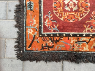 Out of the trunk of a monastery comes this perfect Tibetan square mat, a high rank lama individual seat in extraordinary mint condition, unused, no repairs, excellent wool with typical monastic colors,  ...