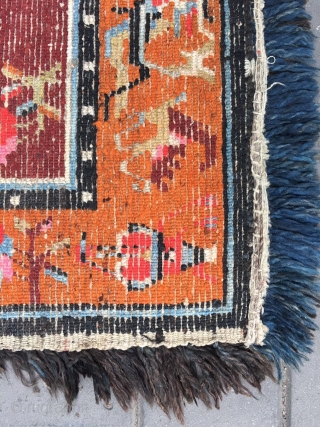 Out of the trunk of a monastery comes this perfect Tibetan square mat, a high rank lama individual seat in extraordinary mint condition, unused, no repairs, excellent wool with typical monastic colors,  ...