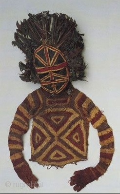 Stunning and rare Chokwe ritual full suit with wooden mask for a medicine-man, complete with two brass bangles and a circumcision knife; Angola, Central Africa, mid-20th century or maybe earlier. This interesting  ...