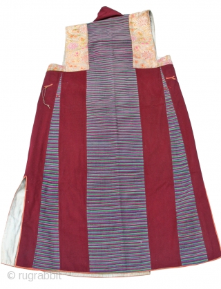 Tibetan Textile. B79 
Woollen Tibetan Chuba
length from shoulder 121cm

Sleeveless Chuba (Tibetan dress) from Tsang, South-West Tibet
early-mid 20th Century               