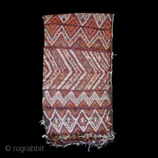 Semi-antique moroccan Amazigh (berber) woven kilim tent cushion

Beautiful example which has detailed handwoven tribal designs on BOTH sides of the cushion. 

Colours: White, black, burgundy, orange, green and brown.
Material: Wool and cotton
Size:  ...
