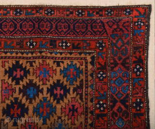 Late 19th Century North East Persian Belüch Rug. This small Baluch woven in the symmetrical knot is from the Qainat region and maybe a weaving of the Bahluli tribe. The camel field  ...