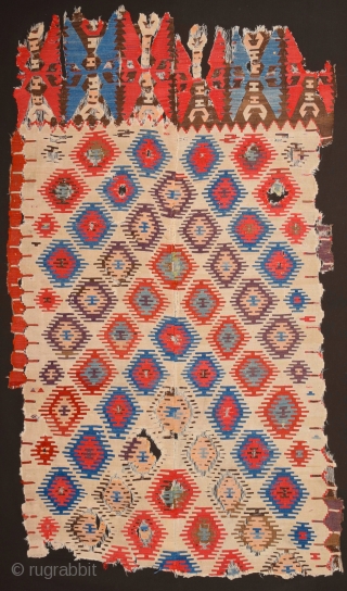 Early example!A fragment of a two-panel kilim from the surroundings of Central Anatolian Sivas, 18th Century Kilim Fragment. It has perfect colors and archaic ends. Size 135 x 230 cm It has  ...