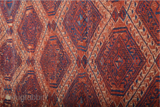 This red-ground Yüncü kilim featuring a deep blue field design of three geometric, stylised trees and a narrow border echoing the shapes of the trees is a visual masterpiece. The reduction to  ...