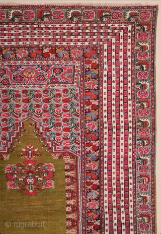 This 19th Century Anatolian Ghordes Green ground prayer rug displays an open field and a steeply towering mihrab shape
It's in perfect condition The prayer rugs of this group were a specialty of  ...