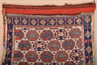South East Caucasus, Moghan region Half of a Moghan Shahsavan Khorjin. The white-ground face woven in the Sumakh technique shows a repeat of offset rows of hexagons enclosing so-called spider güls. The  ...
