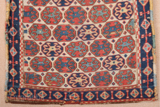 South East Caucasus, Moghan region Half of a Moghan Shahsavan Khorjin. The white-ground face woven in the Sumakh technique shows a repeat of offset rows of hexagons enclosing so-called spider güls. The  ...