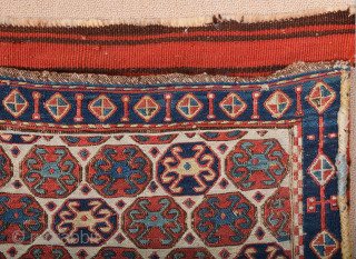 South East Caucasus, Moghan region Half of a Moghan Shahsavan Khorjin. The white-ground face woven in the Sumakh technique shows a repeat of offset rows of hexagons enclosing so-called spider güls. The  ...