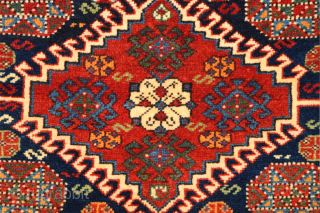 Half of a double bag by the Luri from the Fars area. The design is strongly influenced by Qashqai models, but the coarser weave, with red wool wefts, reveals the Luri origin.  ...