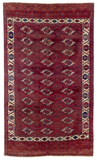 First half 19th century Central Asia, West Turkestan Karadashli Main Carpet

The 33 large chuval güls of the red-brown field are spaciously arranged in rows of three and interspersed with delicately drawn chemche  ...