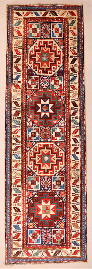 19th Century This very beautiful long rug from the Genje area presents a field design of polychrome diagonal stripes decorated with small usual medallion motifs. The distribution of the colours in the  ...