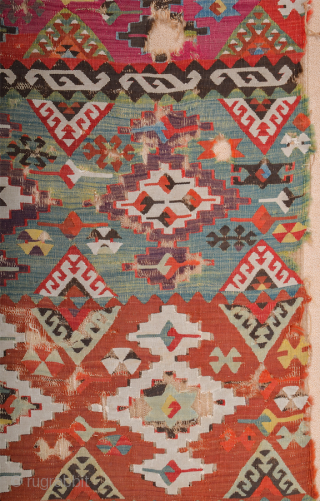 This long, panel kilim was woven by a tribal group of the Reyhanli Confederation in the Gaziantep region. Early 19th Century Anatolian Reyhanlı Kilim Fragment Size 120 x 345 cm All the  ...