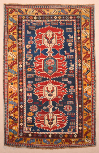 A Small Example Of Shirvan Karagasli Rug.In the Blue field, four large hexagons have been lined up along a pole placed on the central axis, crowned with a serrated palmette at each  ...