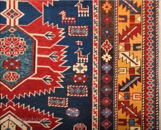 A Small Example Of Shirvan Karagasli Rug.In the Blue field, four large hexagons have been lined up along a pole placed on the central axis, crowned with a serrated palmette at each  ...