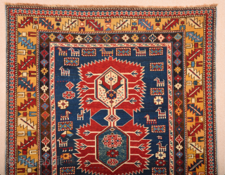 A Small Example Of Shirvan Karagasli Rug.In the Blue field, four large hexagons have been lined up along a pole placed on the central axis, crowned with a serrated palmette at each  ...