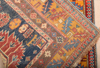 A Small Example Of Shirvan Karagasli Rug.In the Blue field, four large hexagons have been lined up along a pole placed on the central axis, crowned with a serrated palmette at each  ...